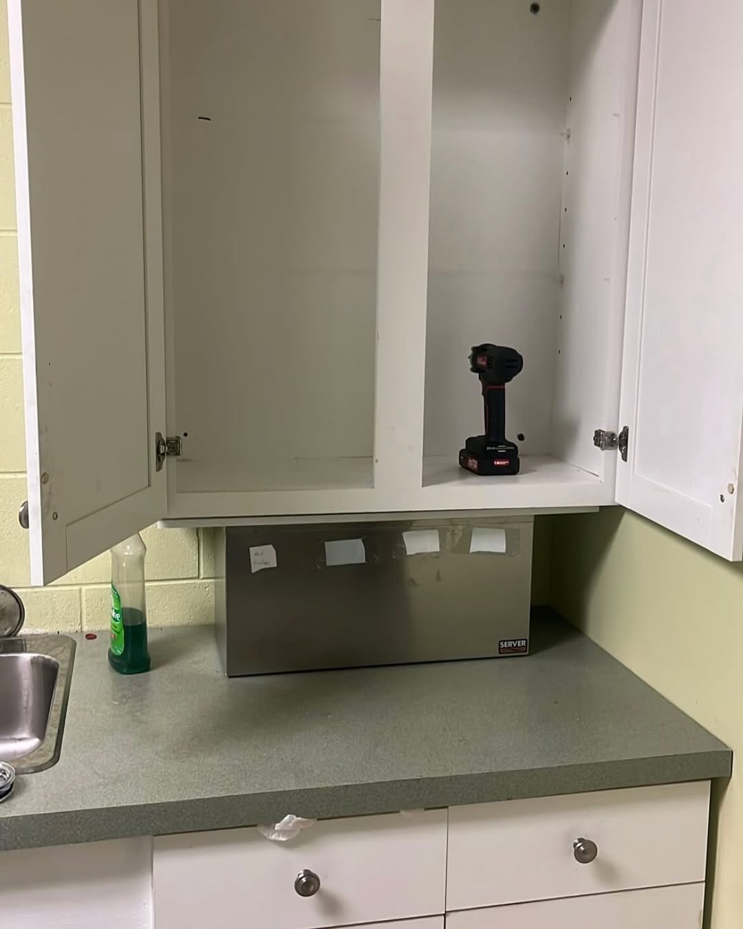 Removal of existing kitchenette, snd sink getting ready to do commercial grade flooring to bring